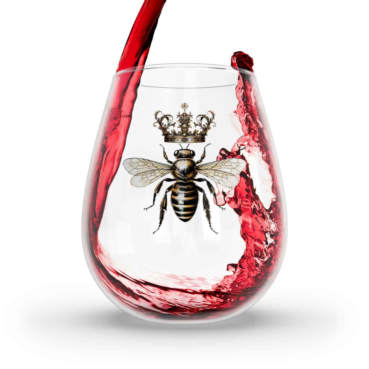 Red wine pouring into a stemless wine glass with the image of a Queen Bee